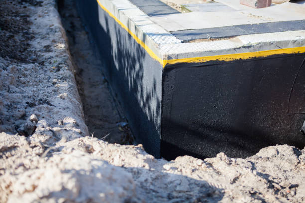 Professional Emergency Waterproofing technician working in New Vienna, OH